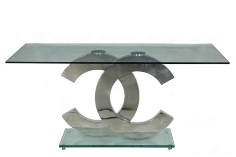 Sold at Auction: COCO CHANEL GLASS TOP DINING TABLE